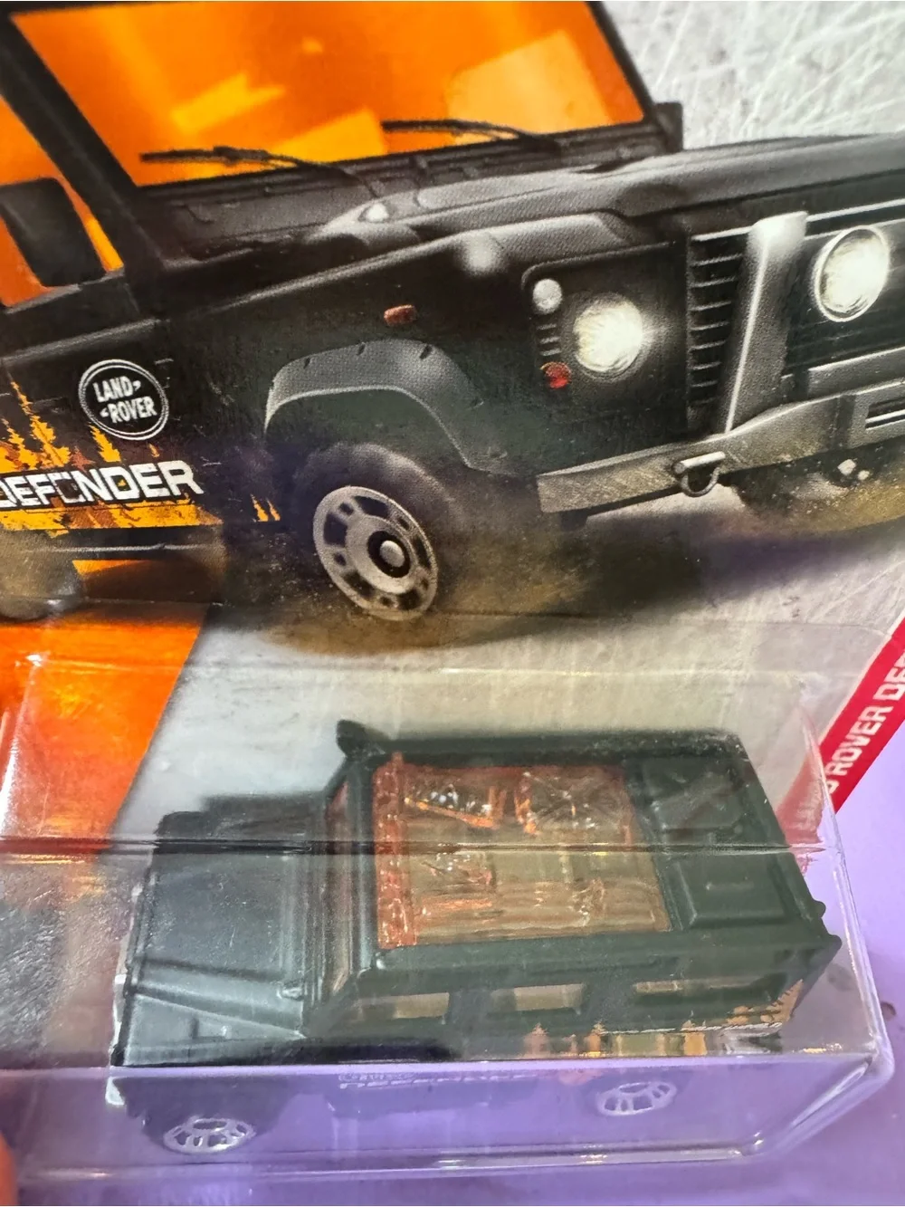 Matchbox Land Rover Defender 110 Toy Car - Black & Orange